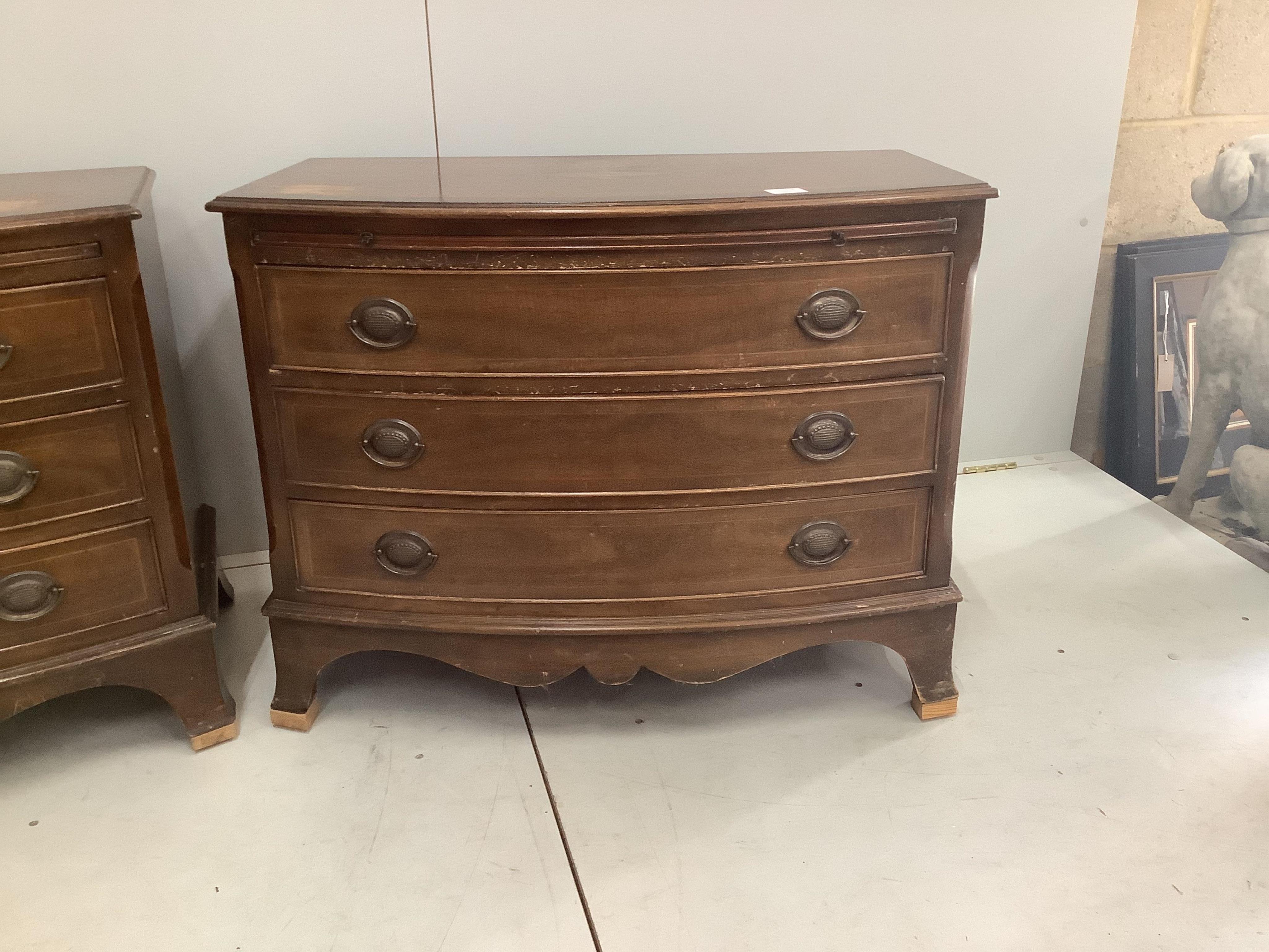 A pair of reproduction inlaid mahogany bow front chests of three long drawers, width 87cm, depth 49cm, height 68cm. Condition - poor to fair